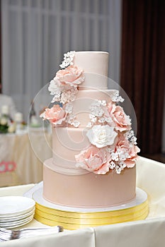 Big wedding four tiers cake with flowers