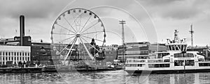 Big wheel and Helsinki harbour in Finland, black and white picture