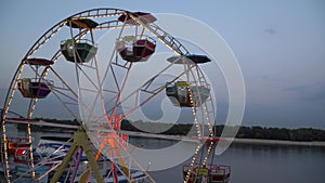 Big wheel illuminated colorful lights spinned motion