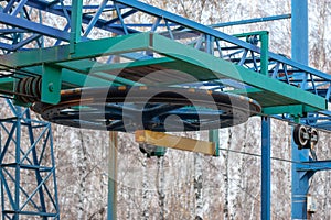 The big wheel from roller system with cables for Ski lift close-up.