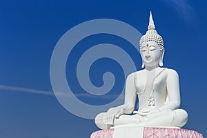 Big white buddha statue and blue sky