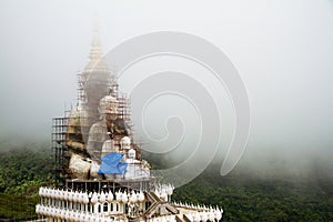 Big white buddha statue Under construction