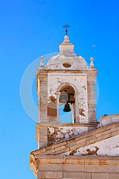 The big, white church of Lagos in Portugal in the sunshine