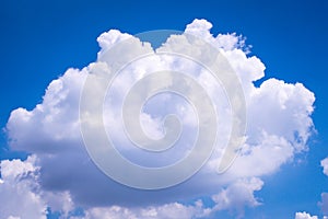 Big White Clouds Against bright Blue Sky abstract seasonal nature background