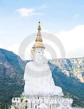 The big white five buddha statue at wat phra thart pha son kaew in Khao Kho