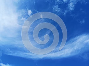 Big white fluffy clouds in the blue sky.Summer background