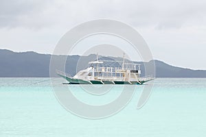 Big white motor boat on blue tropical sea, Philippines Boracay i