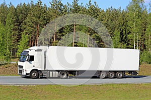 Big White Semi Truck on Freeway