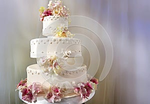 Big white wedding cake decorated