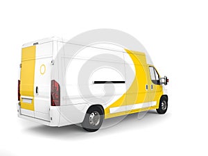 Big white and yellow delivery van - tail view