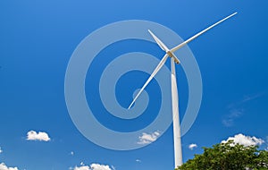 Big Windmills for electric power production on blue sky