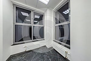 Big windows in empty unfurnished room interior in white style color in modern apartments,  office or clinic