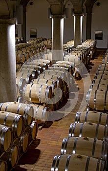 Big wine cellar with old oak barrels, production of red dry or sweet wine in Marsala, Sicily, Italy