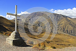 Big wood cross on the mountains