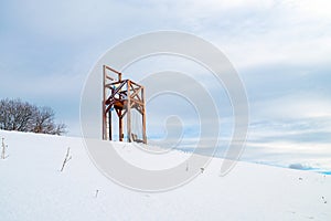 Big wooden chair as lookout in region Orava called bacv stolec in Slovakia