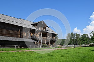 Big wooden village house. Wooden architecture