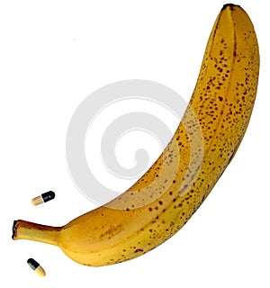 Big yellow banana with two pills