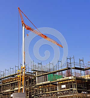 Big yellow hoisting crane photo