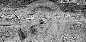 Big yellow mining truck coal transportation. Open pit mine industry