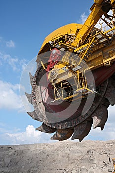 Big yellow wheel of coal excavator