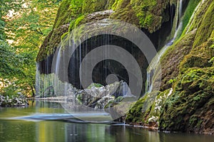 Bigar Cascade Falls in Nera Beusnita Gorges National Park, Romania. photo