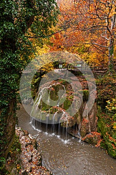 Bigar Waterfall in the Romanian mountains - amazing view of one of the most beautiful waterfalls in Europe during an autumn day wi