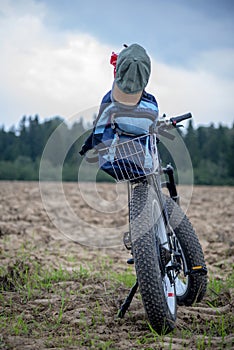 Bike with backpack in countryside