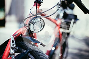 Bike in the city: Front picture of a city bike, blurred background