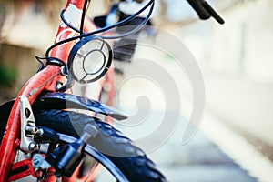 Bike in the city: Front picture of a city bike, blurred background