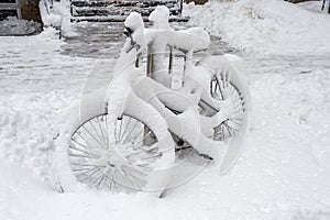 Bike covered with fresh snow