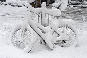 Bike covered with fresh snow
