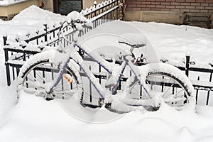 Bike covered with fresh snow