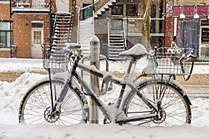 Bike covered with fresh snow in Montreal