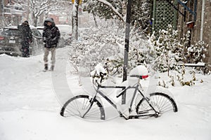 Bike covered with fresh snow in Montreal