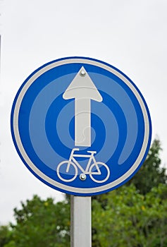 Bike cycle lane sign on park.