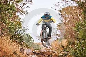 Bike, cyclist and sport, cycling in the woods, fitness and energy with extreme sports outdoor. Bicycle, exercise in