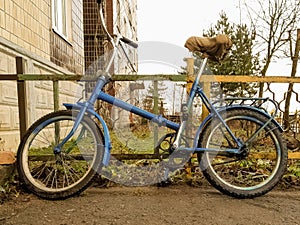 the bike is at the fence