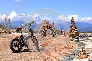 Bike in front of Red Rocks (called \