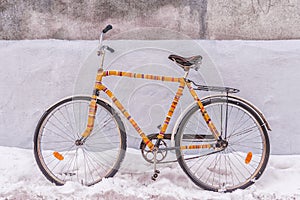 Bike insulated knitted garment decorated on a snowy street