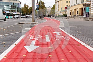 bike lane or red road with signs of bicycles