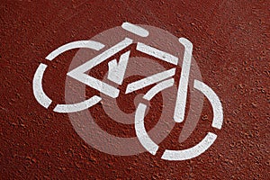 Bike lane sign on the pavement