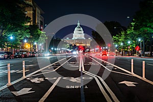 Bike lanes on Pennsylvania Avenue and the United States Capitol at night, in Washington, DC