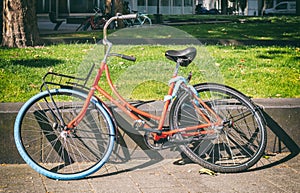 Bike leaned on a wayside in Rotterdam city, Netherlands