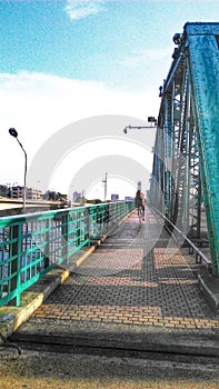 Bike on the Memorial Bridge over Chaophaya River photo