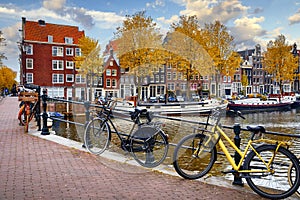 Bike over canal Amsterdam city picturesque town. Vector illustration. Illustrative editorial use only.