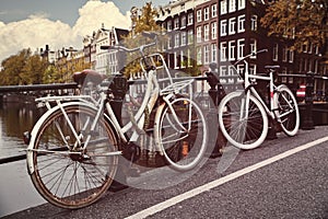 Bike over canal Amsterdam city picturesque town. Vector illustration. Illustrative editorial use only.