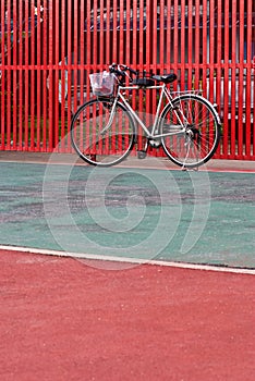 Bike park at red grate door