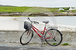 Bike parked on Inishmore, the largest of the Aran Islands in Galway Bay. Renting a bicycle is one of the most popular way to get