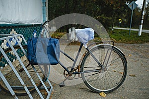 Bike is parked in the shop. An old bike