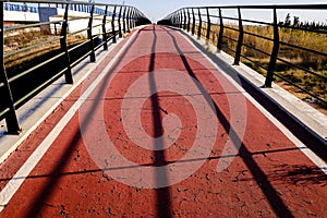 Bike path next to a concrete bridge in a rural area with good infrastructure in Spain